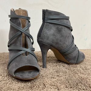 Faux suede grey open toe booties. Excellent condition. Worn only once or twice.